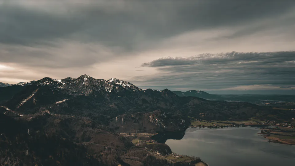 Aerial view of Kochelsee lake surrounded by the Bavarian Alps