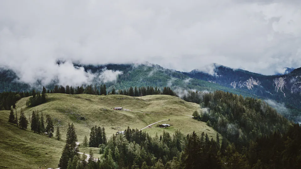 Misty forested hills and mountains near Berchtesgaden